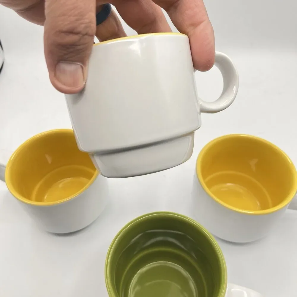 Crate and Barrel Stackable Cups Mugs White with 1 Green and 3 Yellow inside